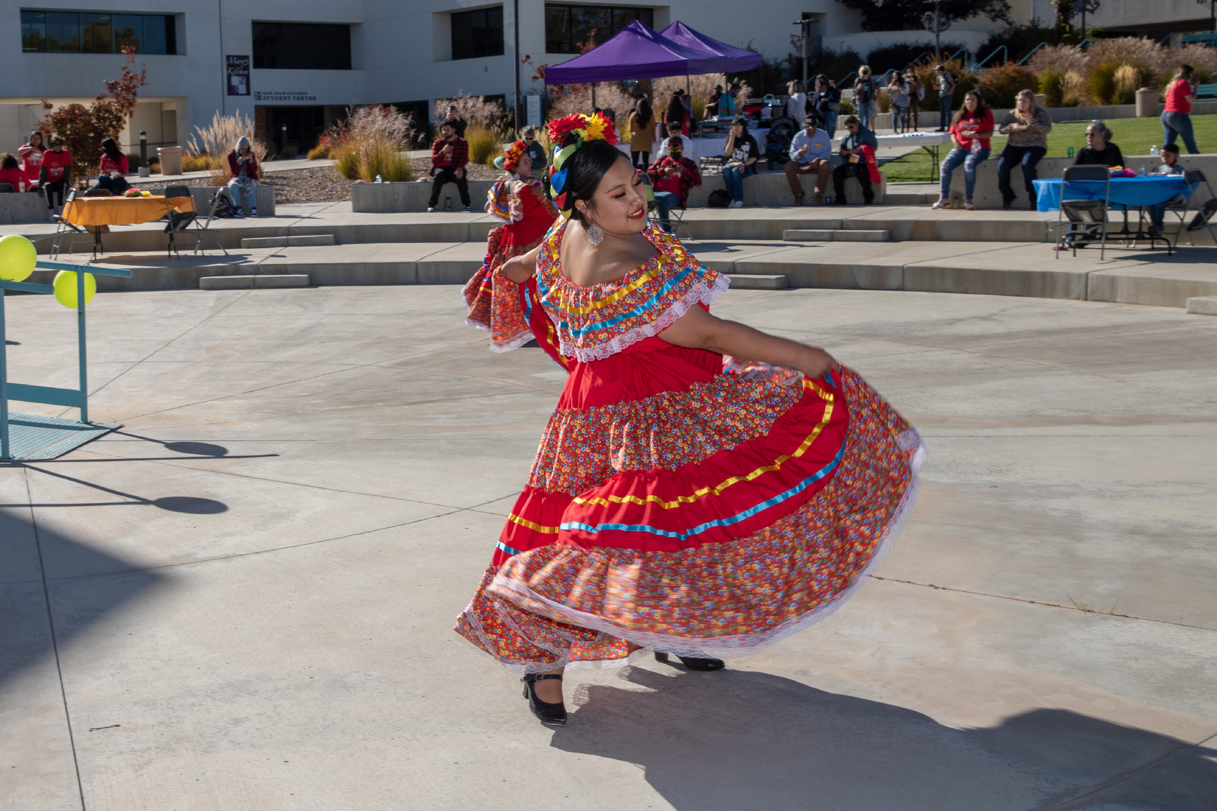 A women dancing in her tradition Hispanic attire