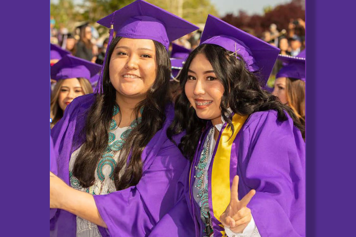 San Juan College Graduates in their purple and gold ragalia
