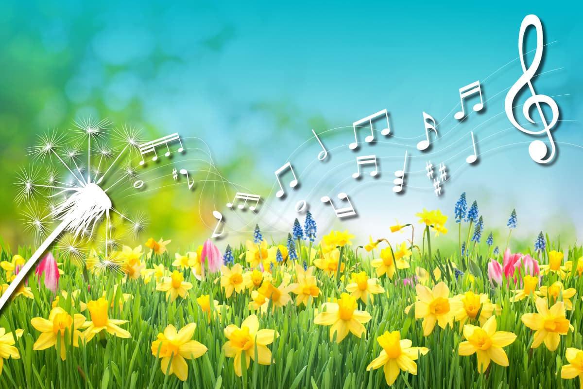 A spring scene with a dandelion and music notes floating to the right