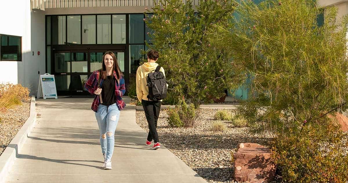 Student walking through campus