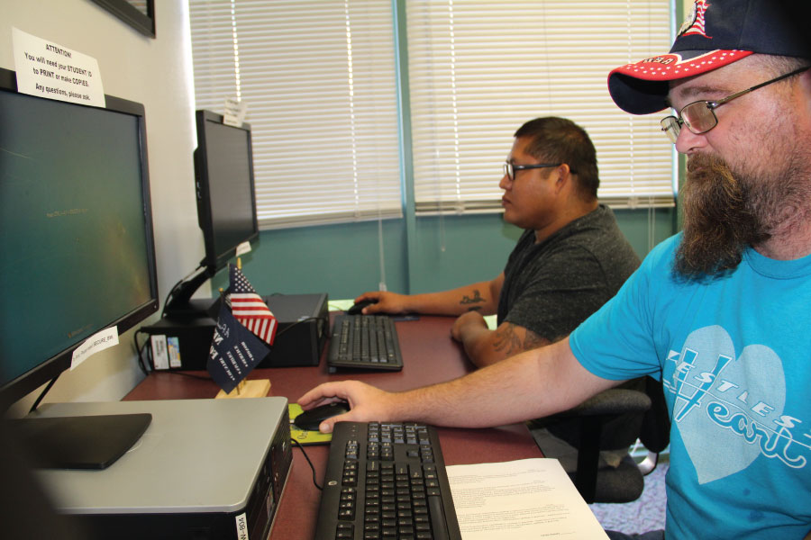 Students sitting and working on computers