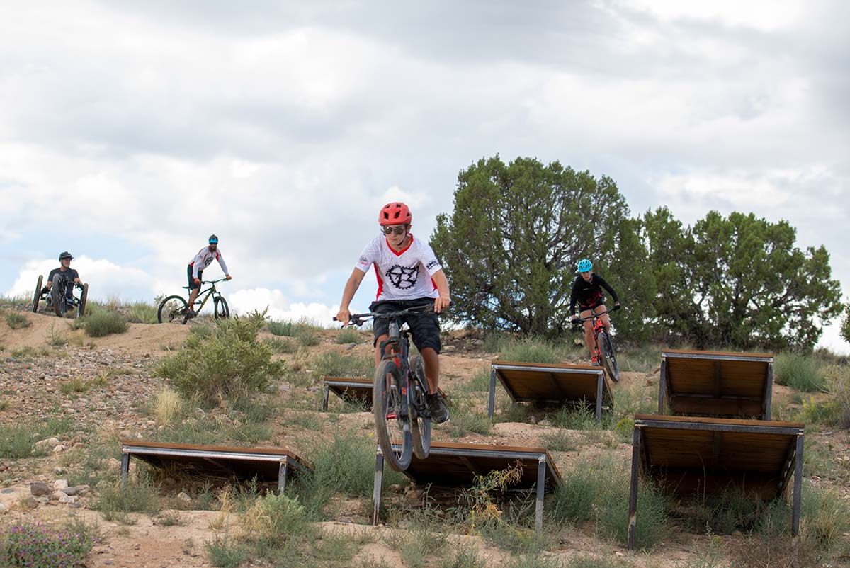 Male riding his mountain bike at the San Juan College Bike Park.