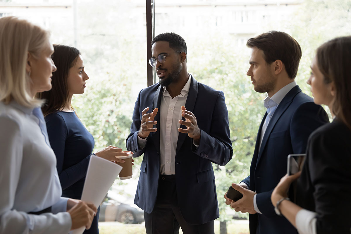 Group of professionals standing in a circle