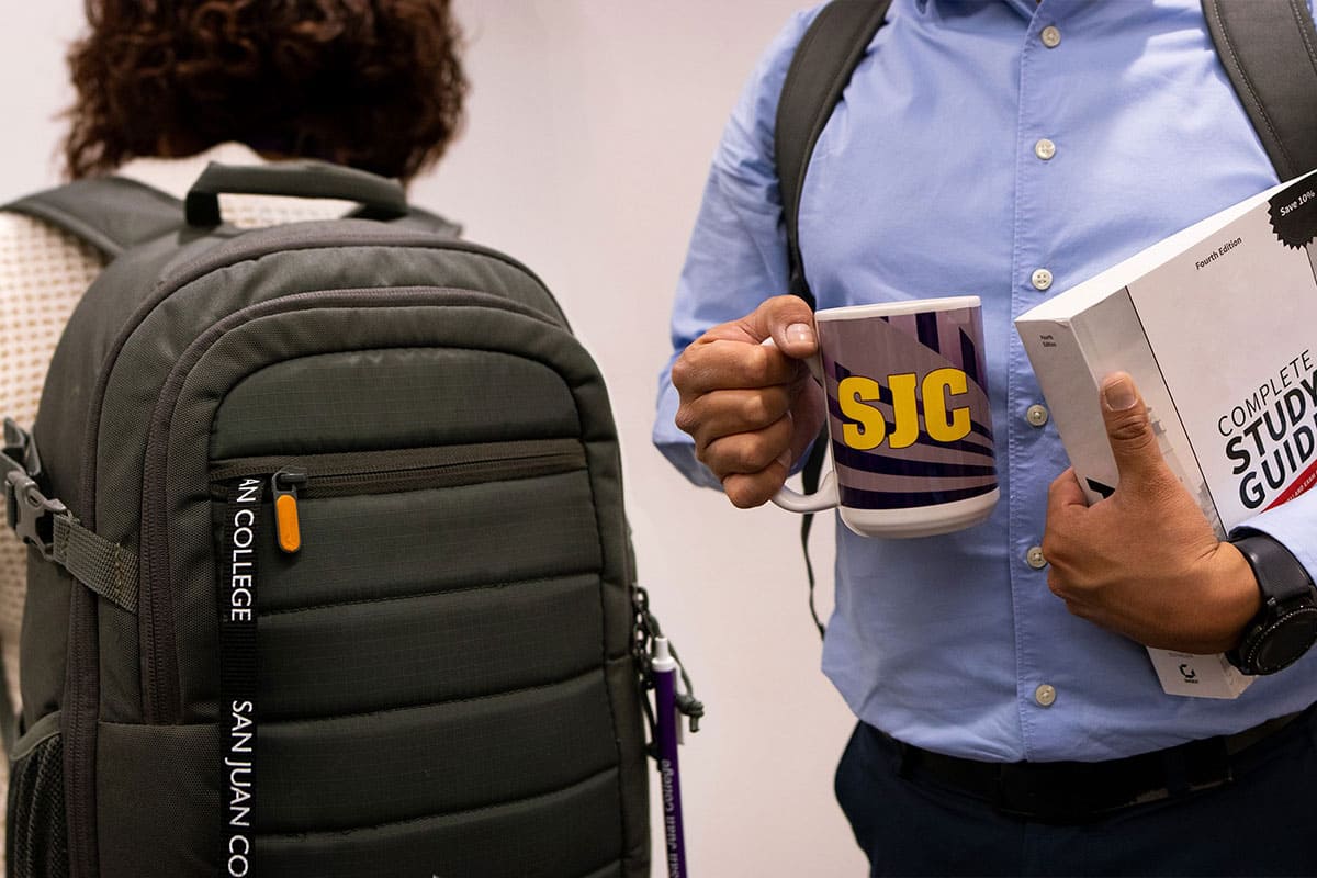 Two Center for Workforce Development students on their way to a customized training program