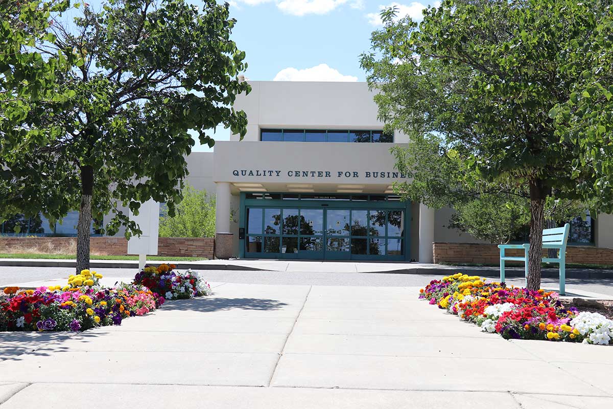 Outside of QCB building in the summer.