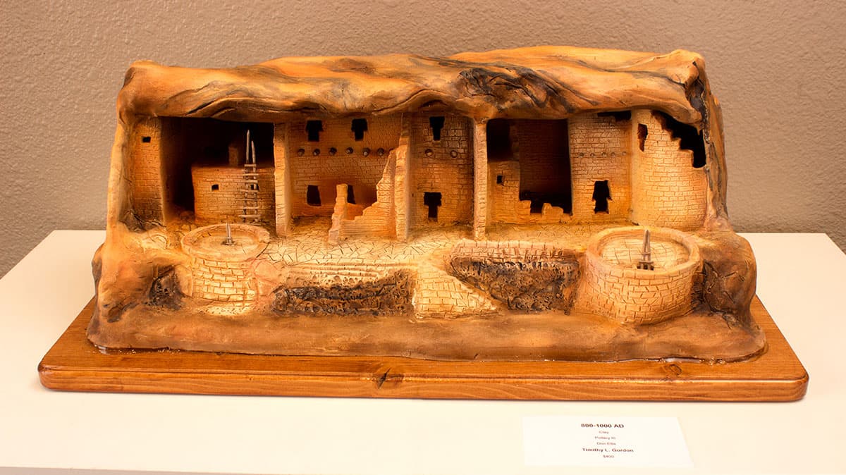 art gallery exhibit piece featuring a Native American ruins