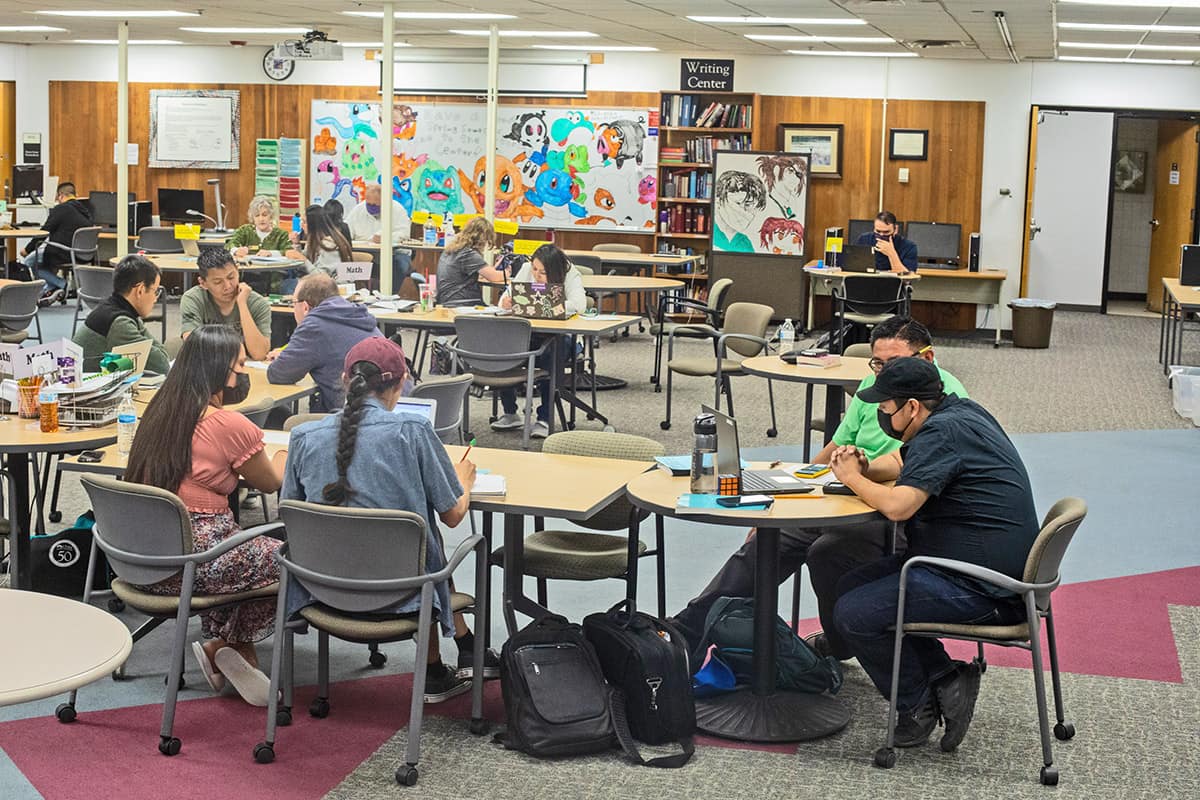 student study in various groups in the student success center