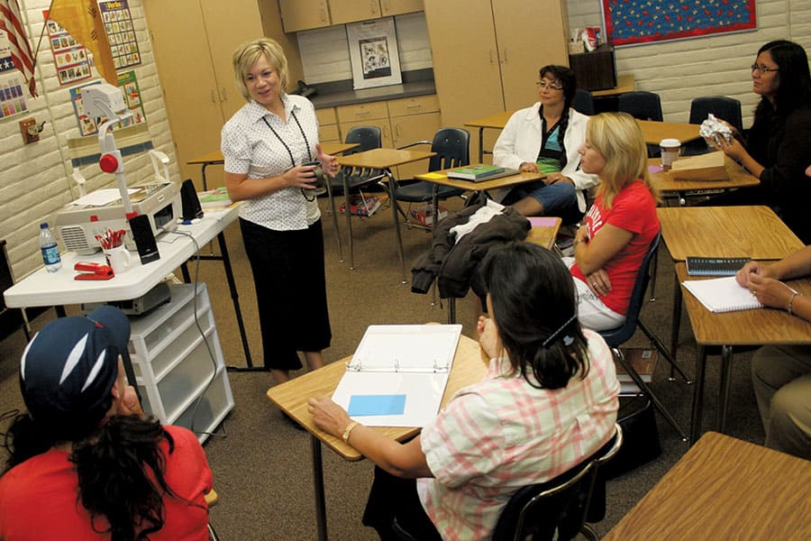 Students and teacher having a discussion