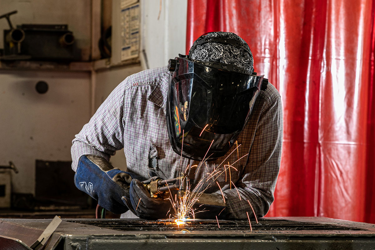 Person welding.