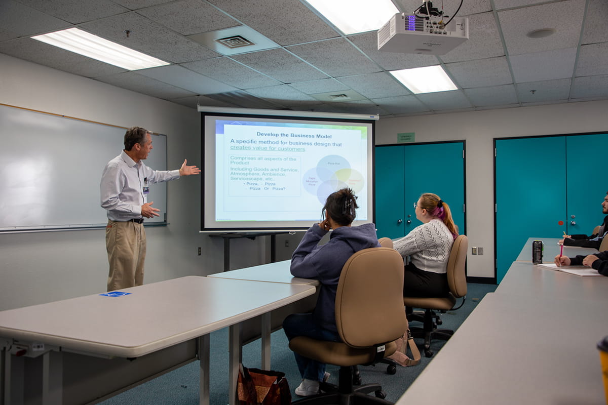 A San Juan College business professor leading a class