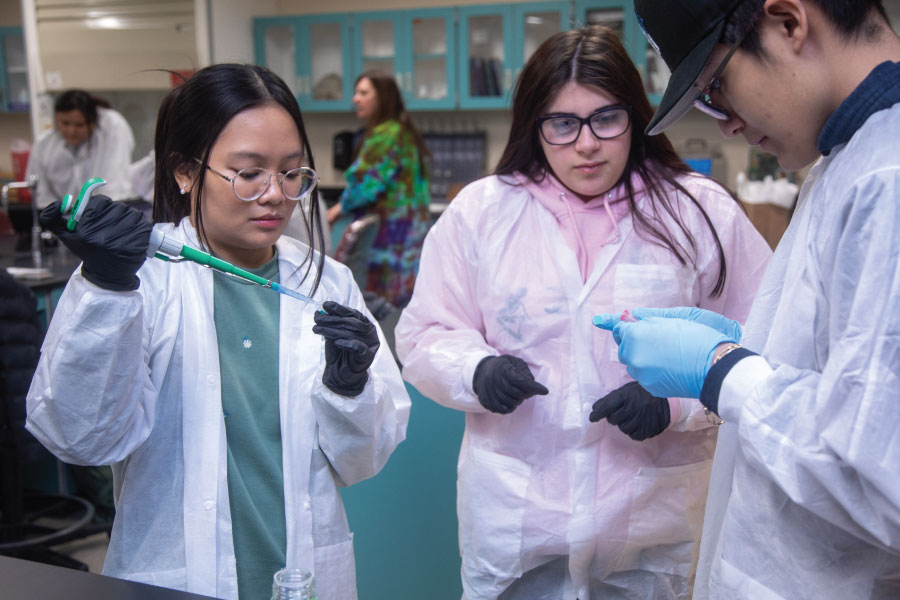 Students learning how to use the equipment in the School of Science, Math and Engineering at San Juan College!