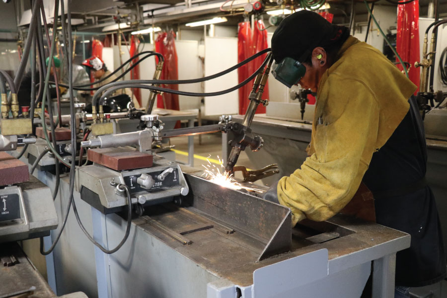 Student utilizing tools on the School of Trades and Technology at San Juan College!