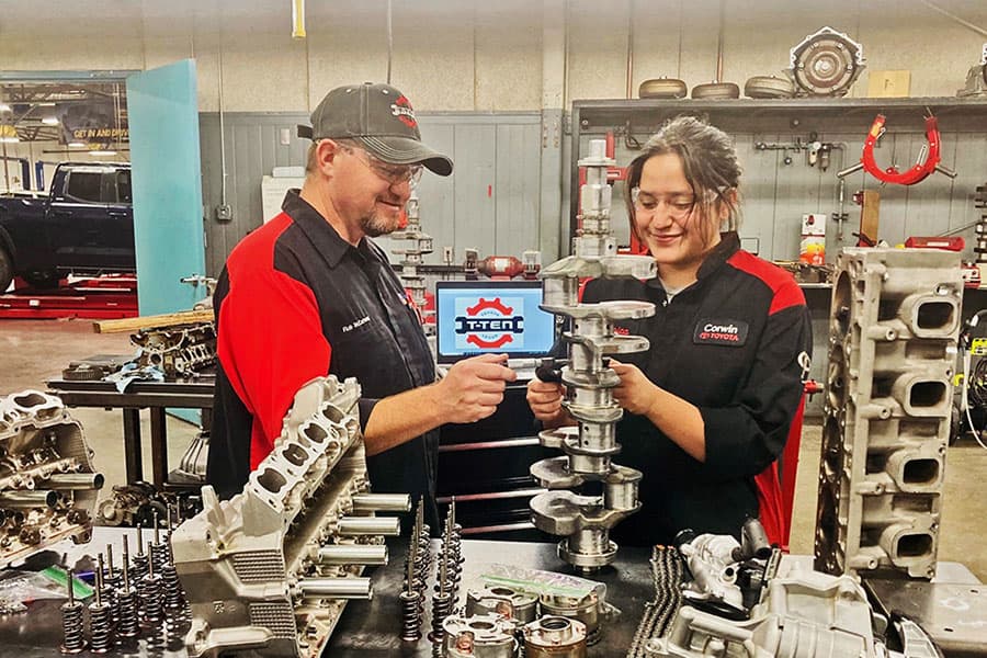 Instructor with students in the Toyota Technical Education Network Program