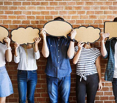 Group of students with chat bubbles over their faces