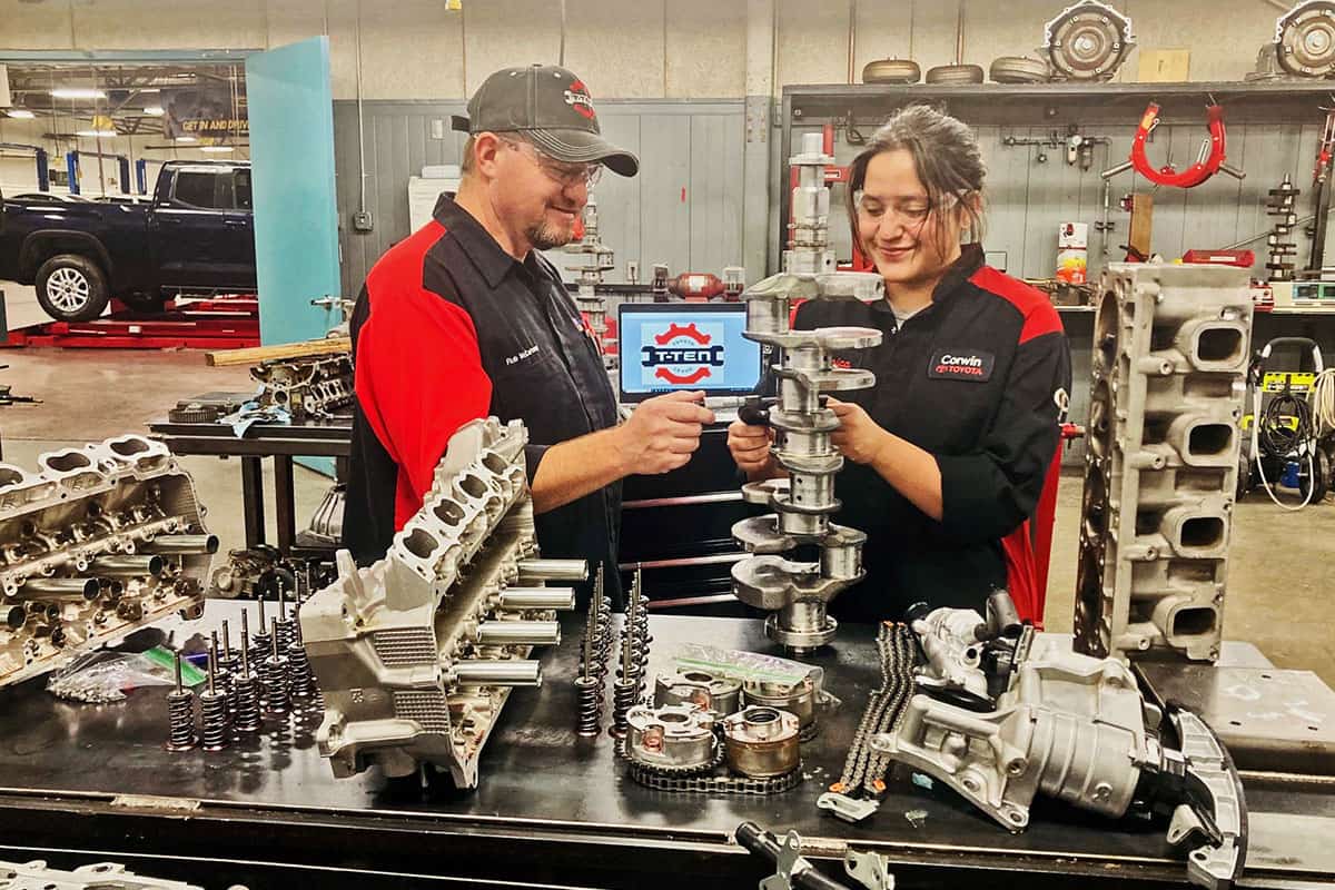 students in the T-TEN program in class working on Toyota parts.