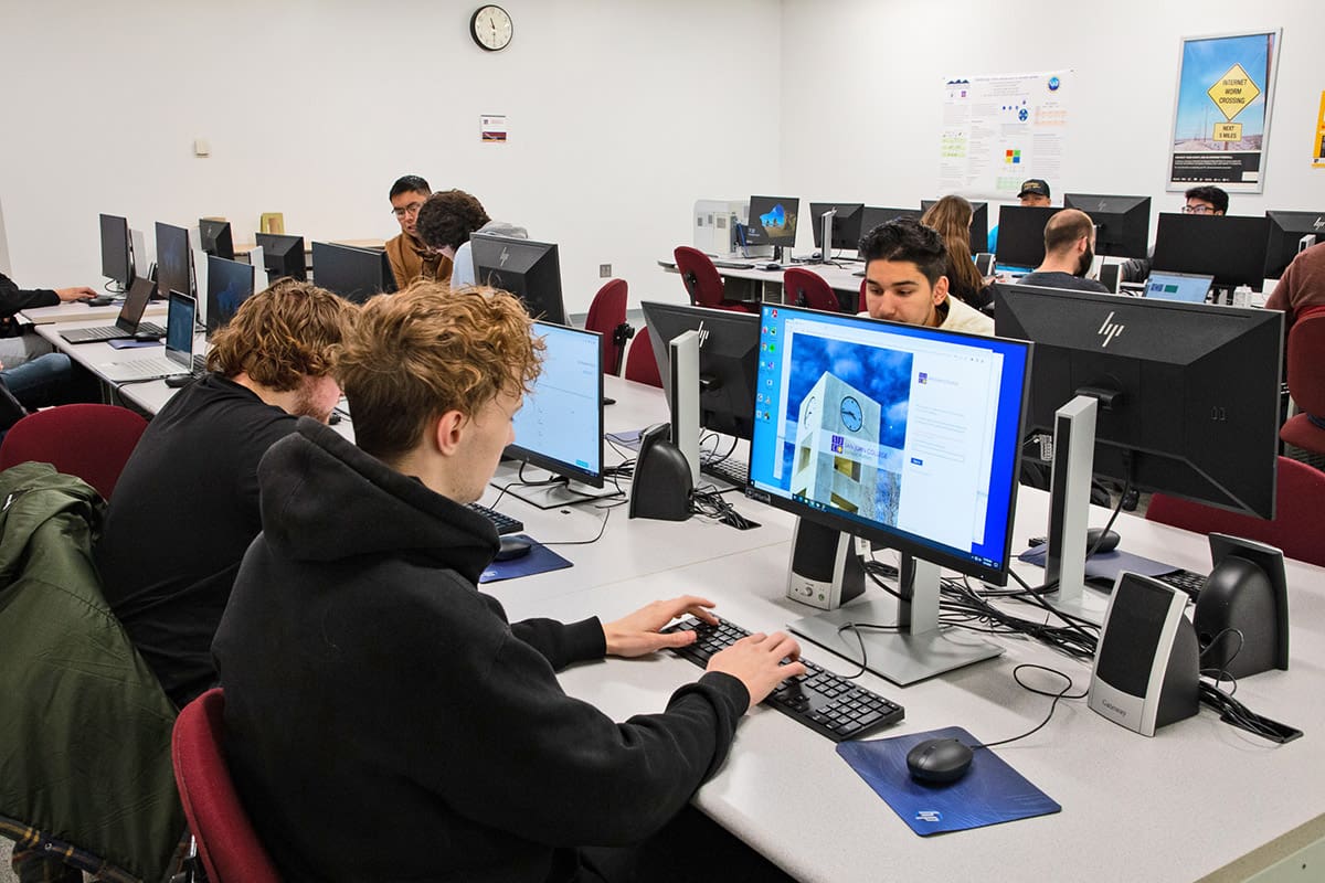 computer science students sign in to student system during class