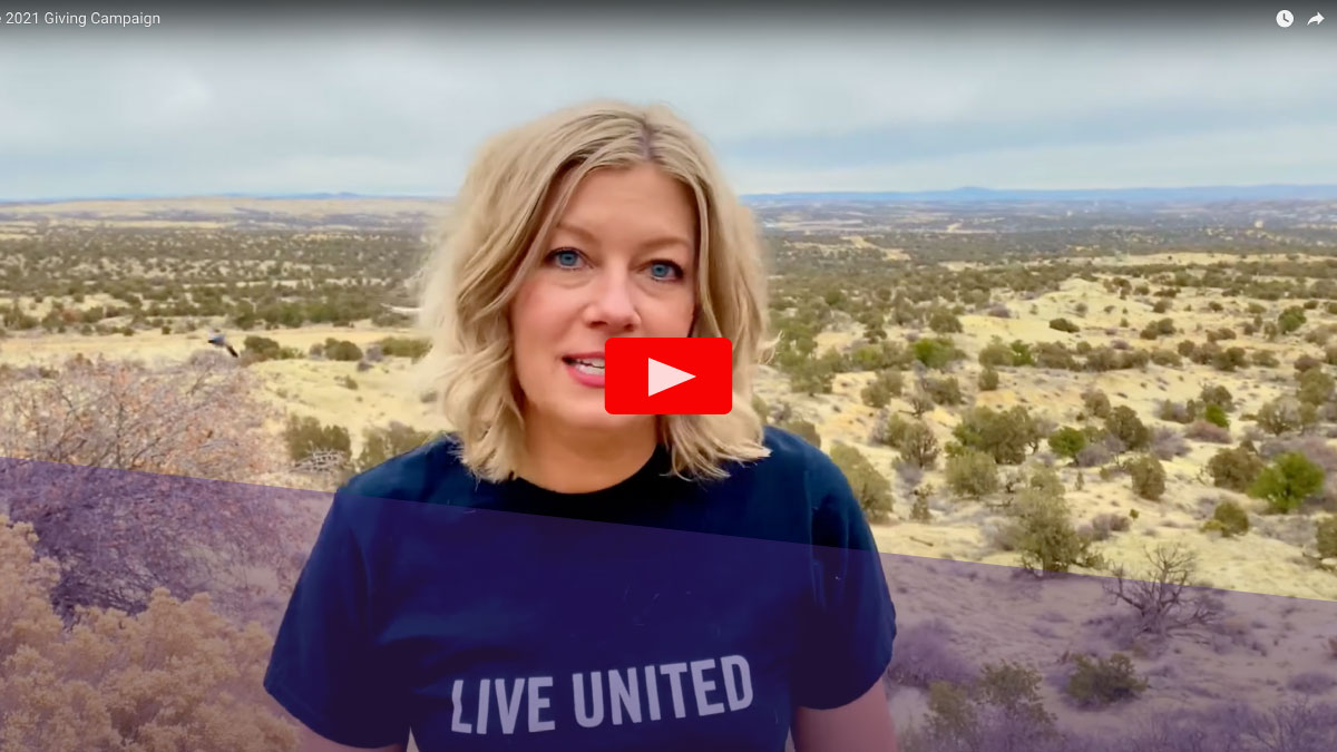 A San Juan United Way employee explaining the Giving Campaign