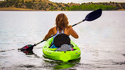 Women on a kayak at Farmington Lake.