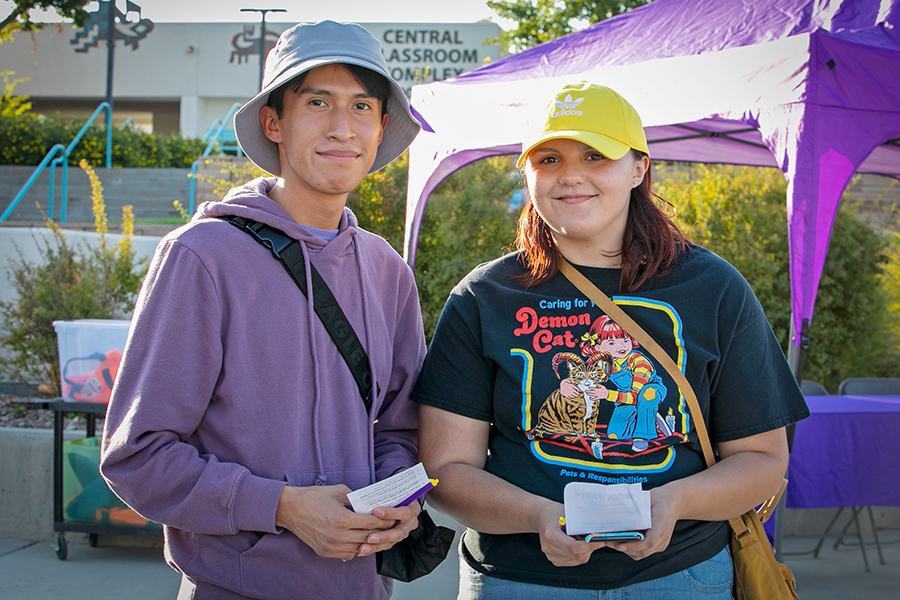 Two students standing together