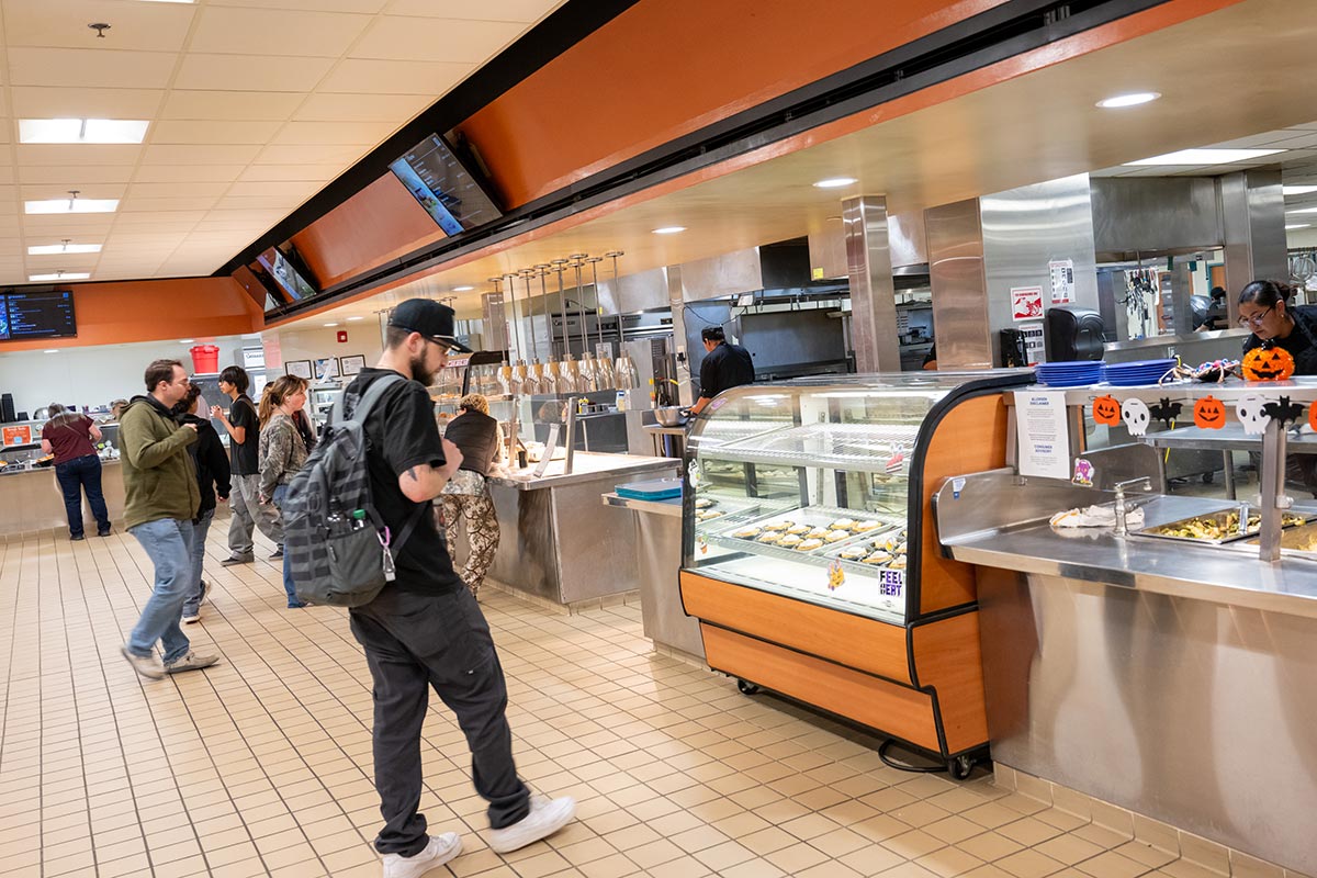 SJC students in Mary's Kitchen ordering lunch which is part of their meal plan.