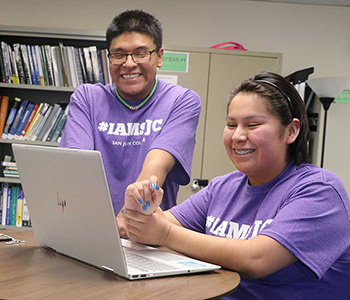 students working at a computer