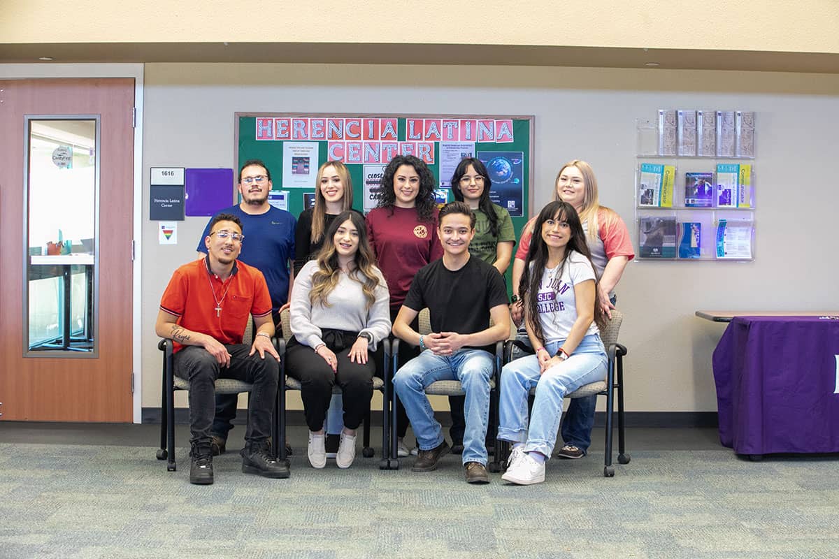 Herencia Latina Center Students at SJC sitting together.