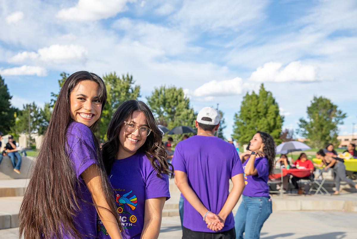 SJC Students at the fiesta at sunset smiling and dancing