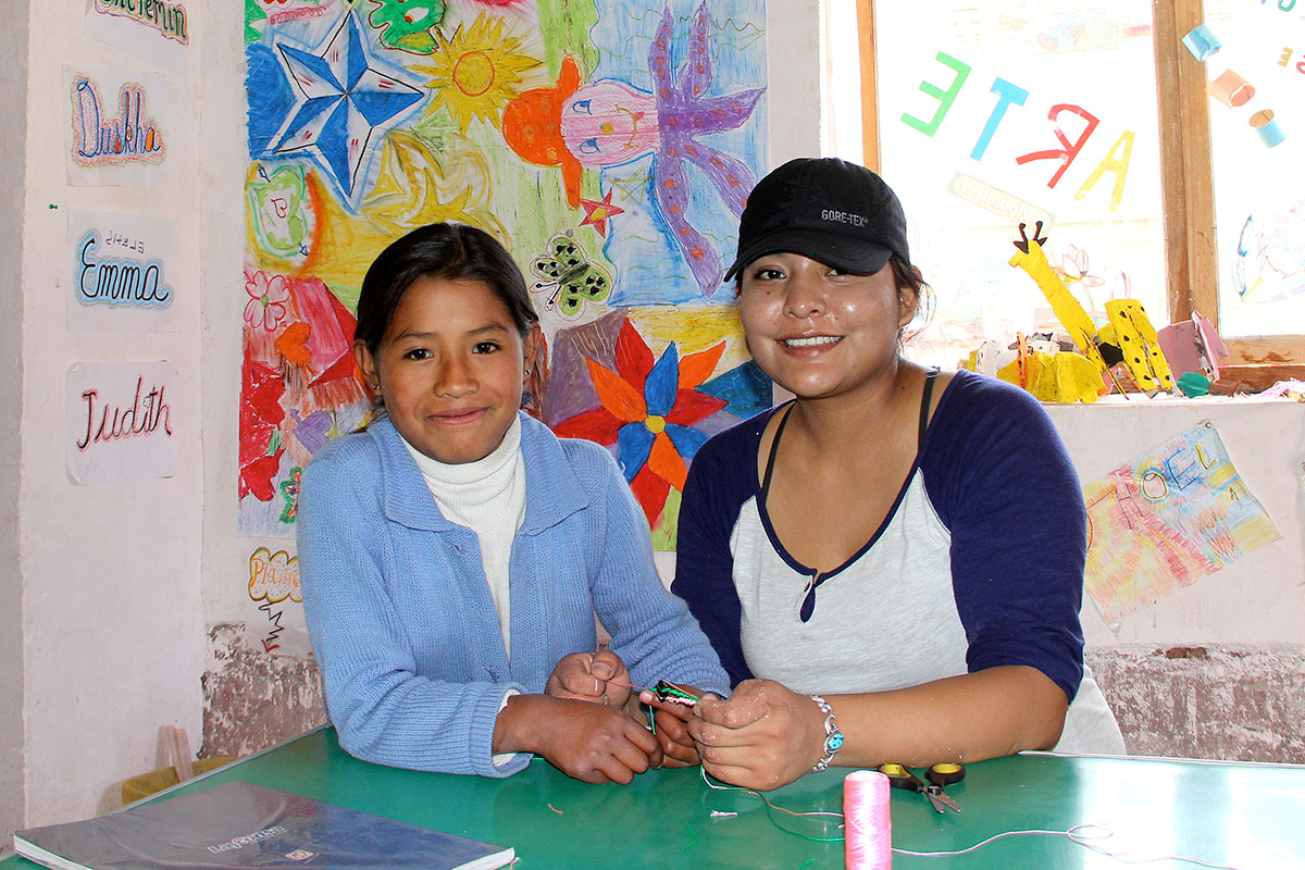 Child and volunteer in daycare setting