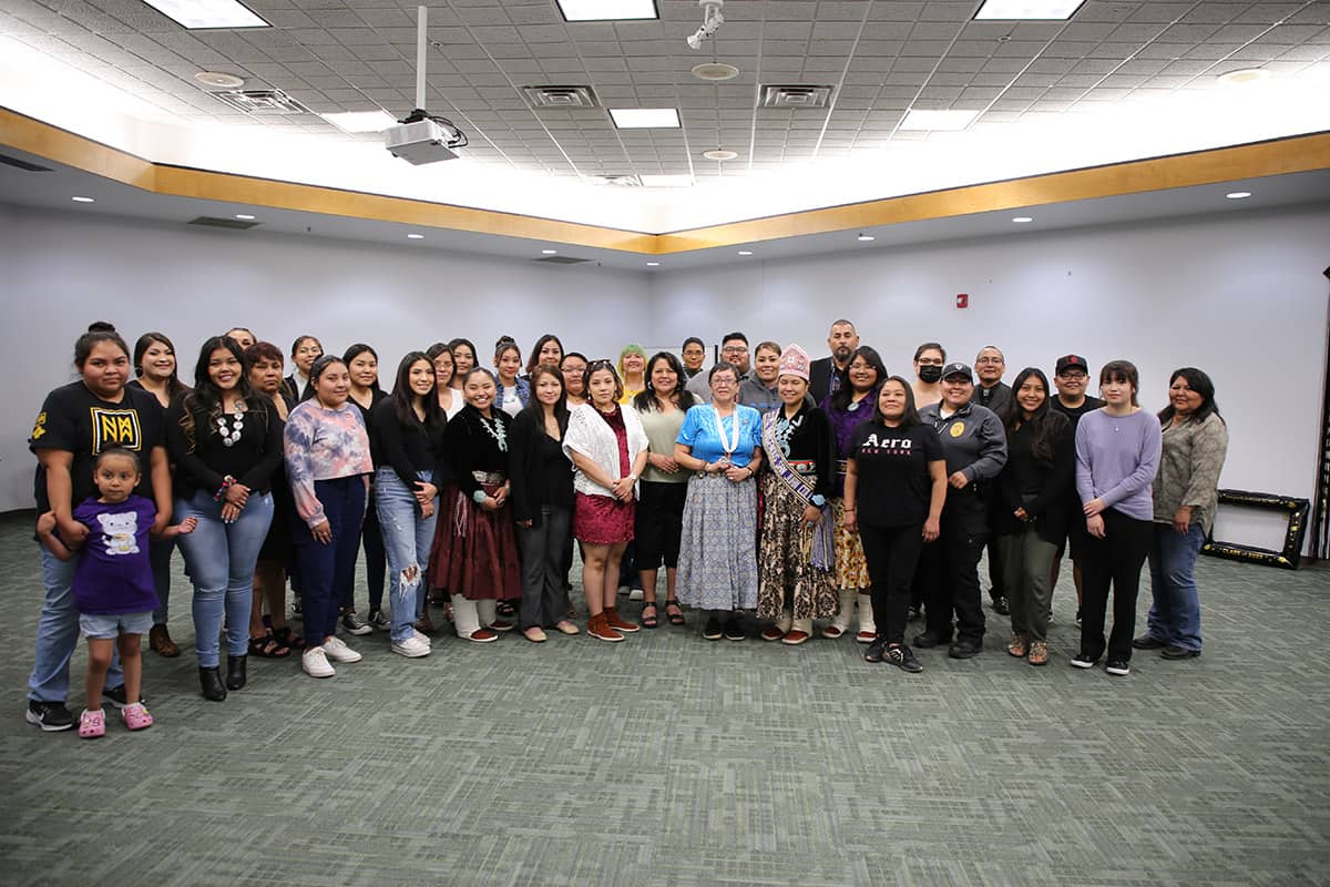 group photo of recent Native American graduates after a reception for the Native American Center