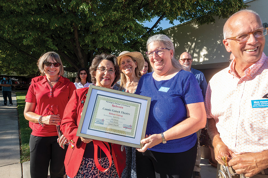 The Farmington Chamber Redcoat Ambassadors presented a plaque to the Connie Gotsch Arts Foundation. Cathy Pope, Foundation Treasurer accepting, at left.