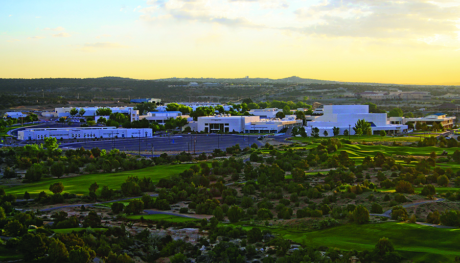 full campus shot with the sun rising in the East