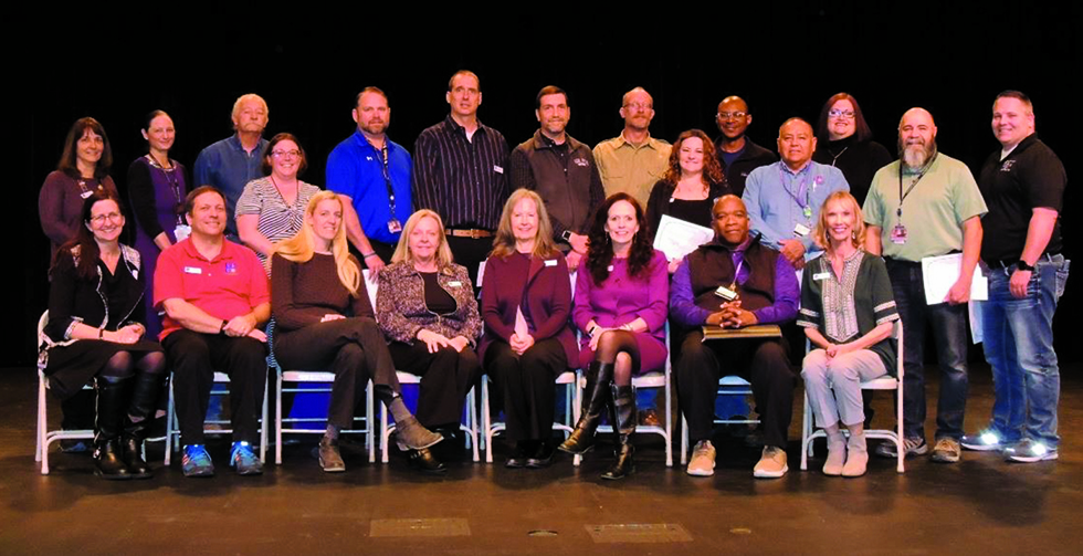 Tarpley Award Recipients of San Juan College sitting in a group posed for a photo.