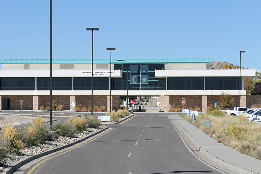 View of the Learning Commons Building with the San Juan College logo on the library windows.